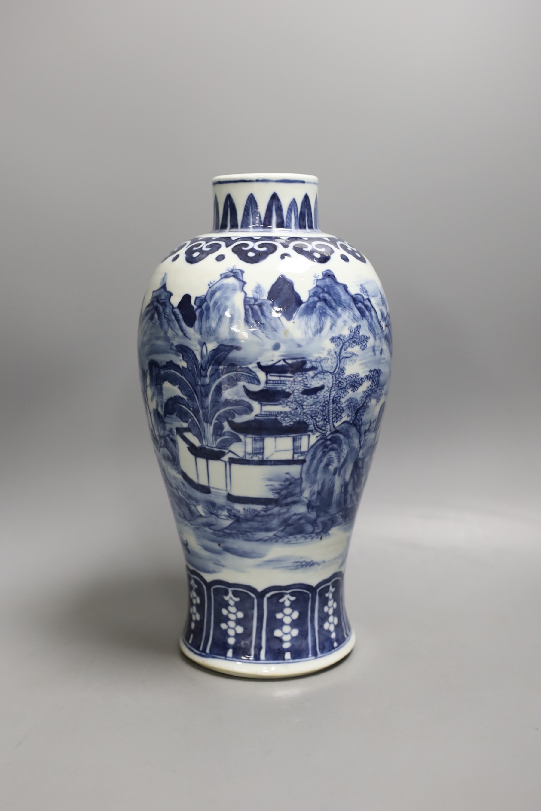 A 19th century Chinese blue and white landscape vase 29cm